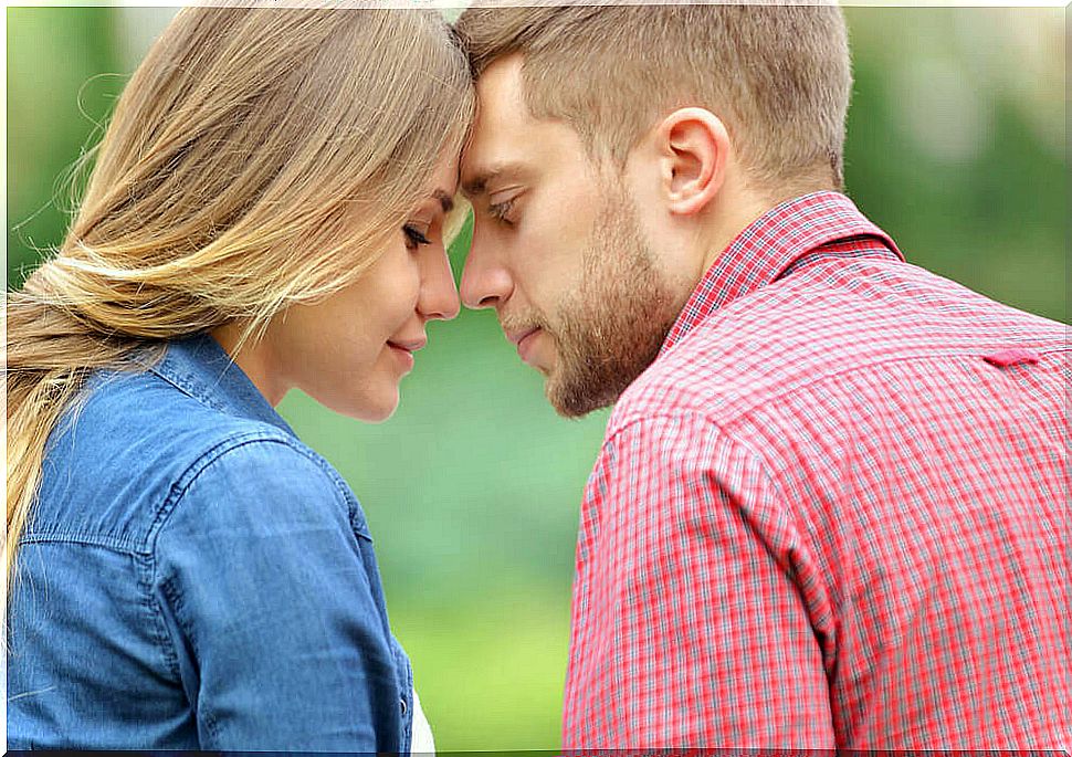 Couple with the foreheads together