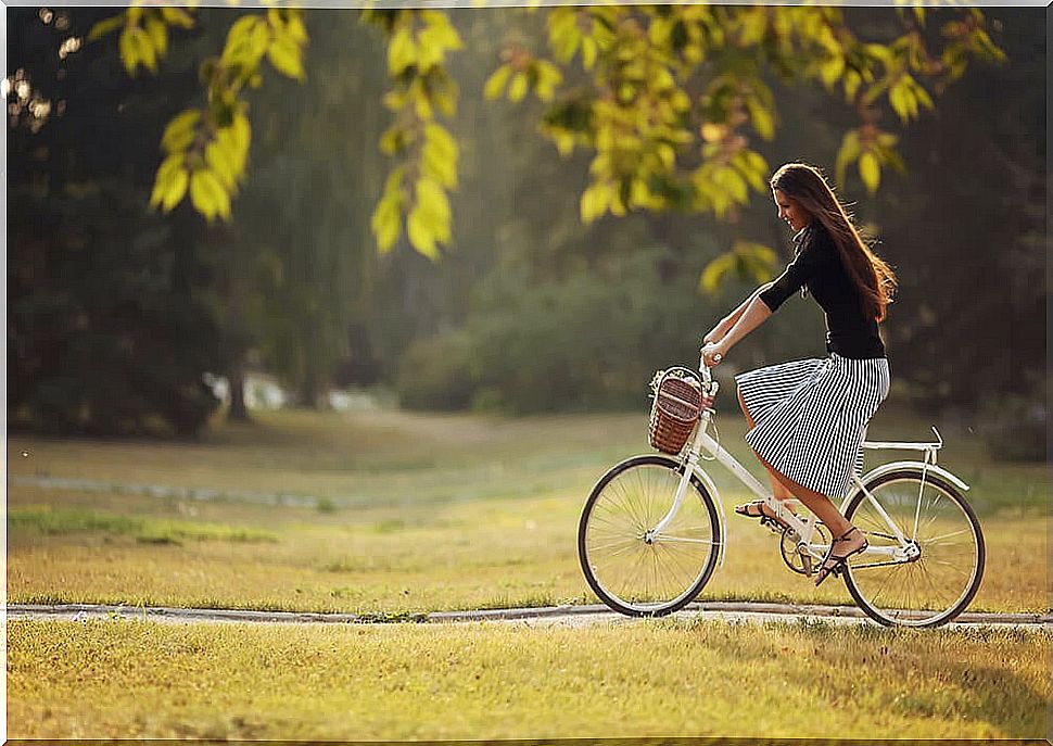 Woman on a bicycle.