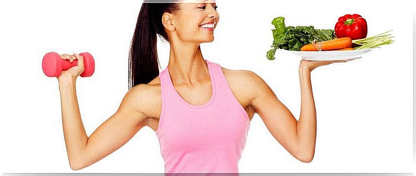 Woman with dumbbell and plate of food.